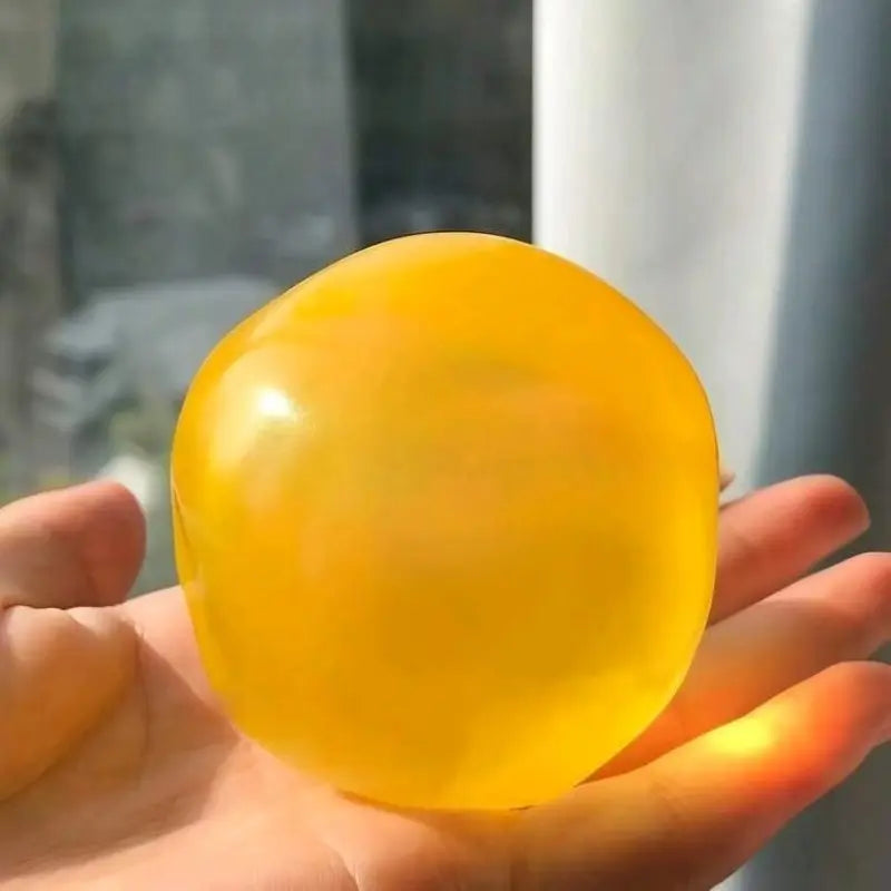 Coconut Oil Stress Ball—a moldable, non-rebounding, handmade sensory toy for relieving anxiety and stress.
